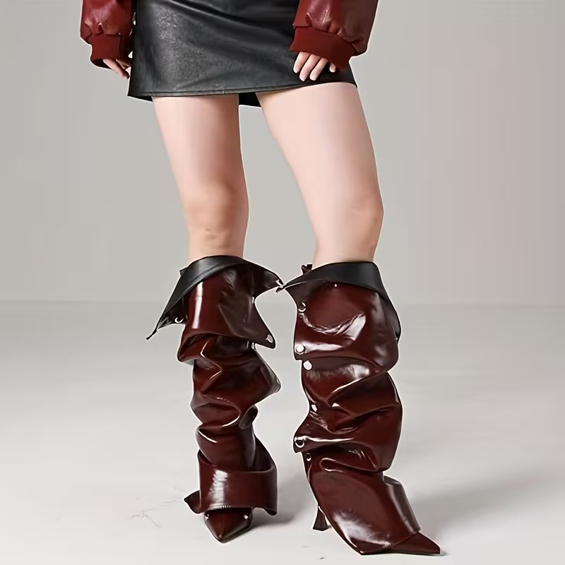 Pointed-toe, effortlessly chic knee-high heels