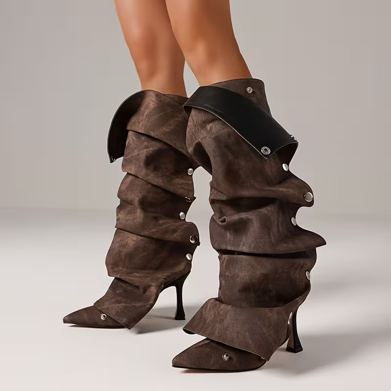 Pointed-toe, effortlessly chic knee-high heels