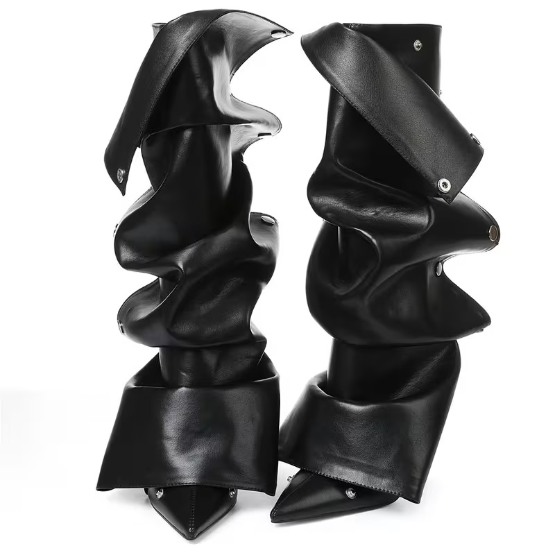 Pointed-toe, effortlessly chic knee-high heels