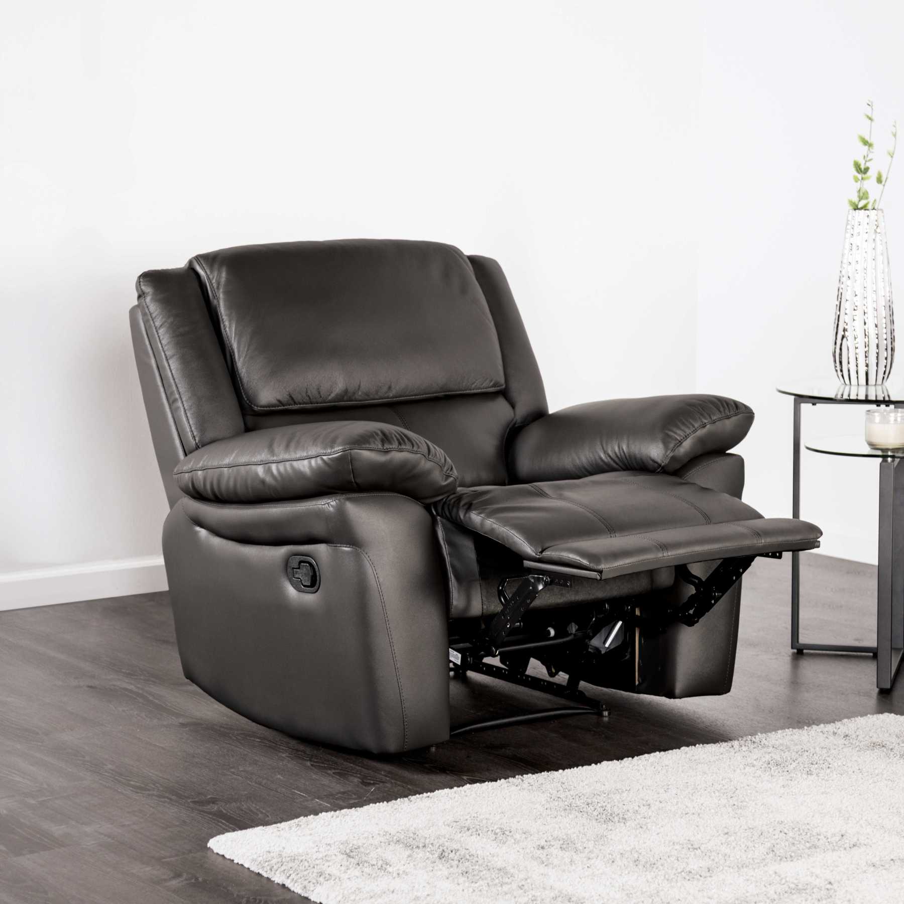 Transitional Leather Match Recliner Chair with Sculpted Padded Arms & Welt Trim