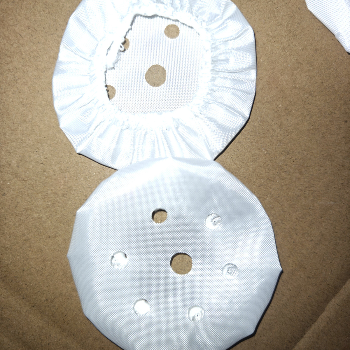 Front and reverse views of a high-temperature vacuum cup fabric cover