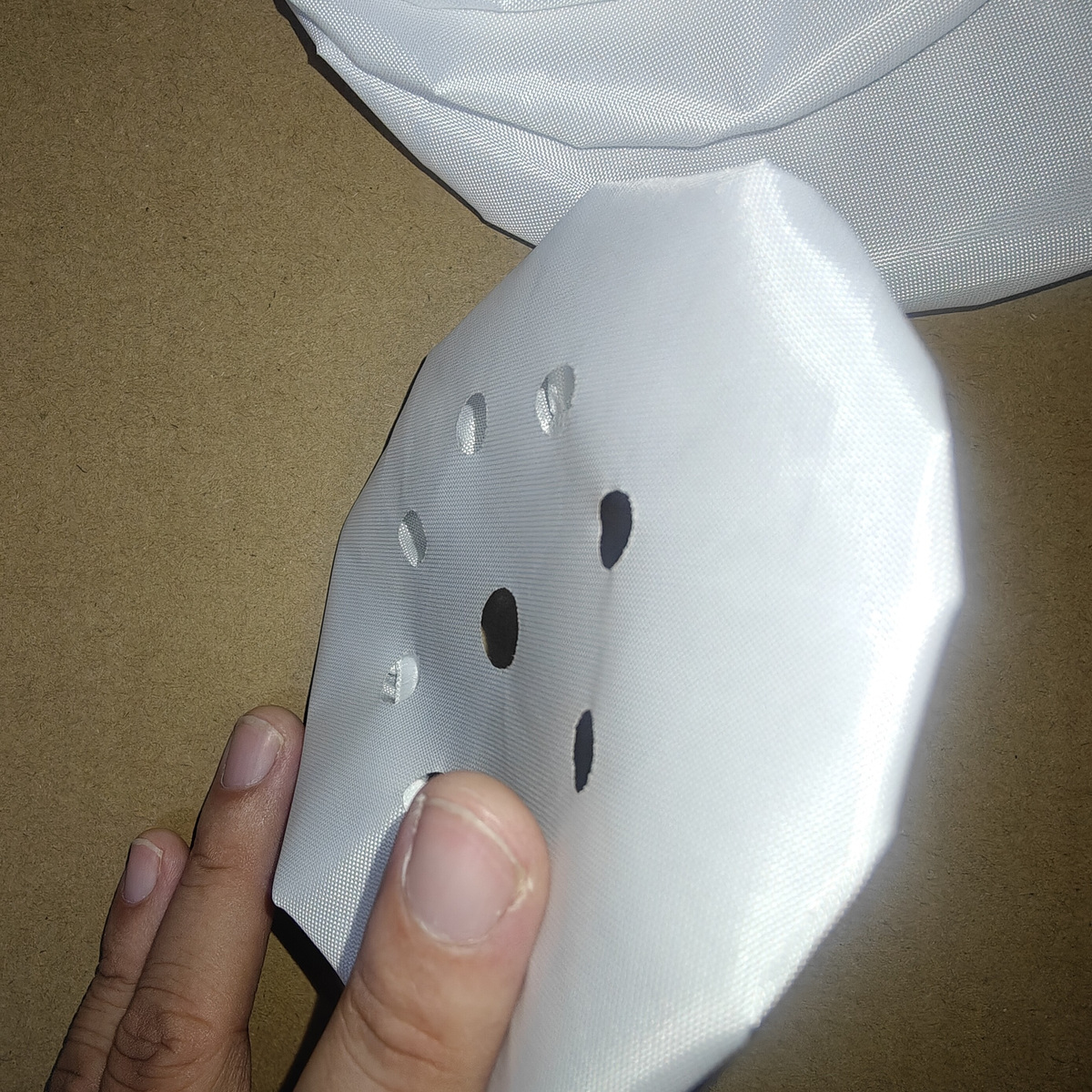 Side profile and fabric texture of a high-temperature vacuum cup cover