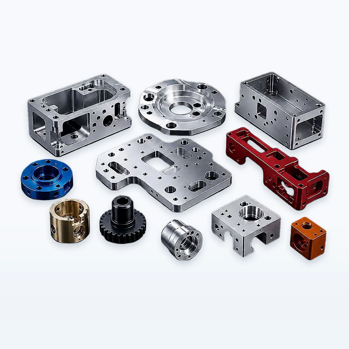 Custom CNC-machined housings, flanges, plates and blocks on a clean studio background