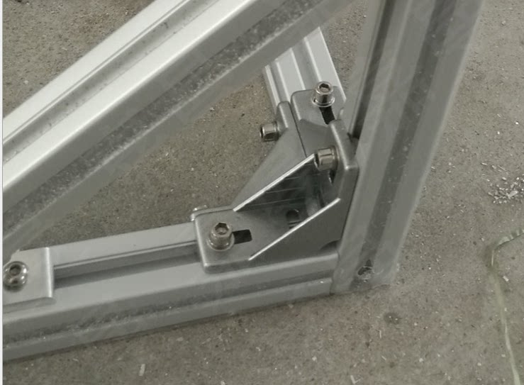 Original angled profile-frame assembly reference; extrusions and bolts not included