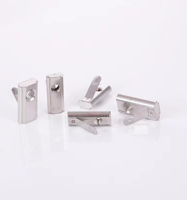 Original spring tab and nut-body detail photographs