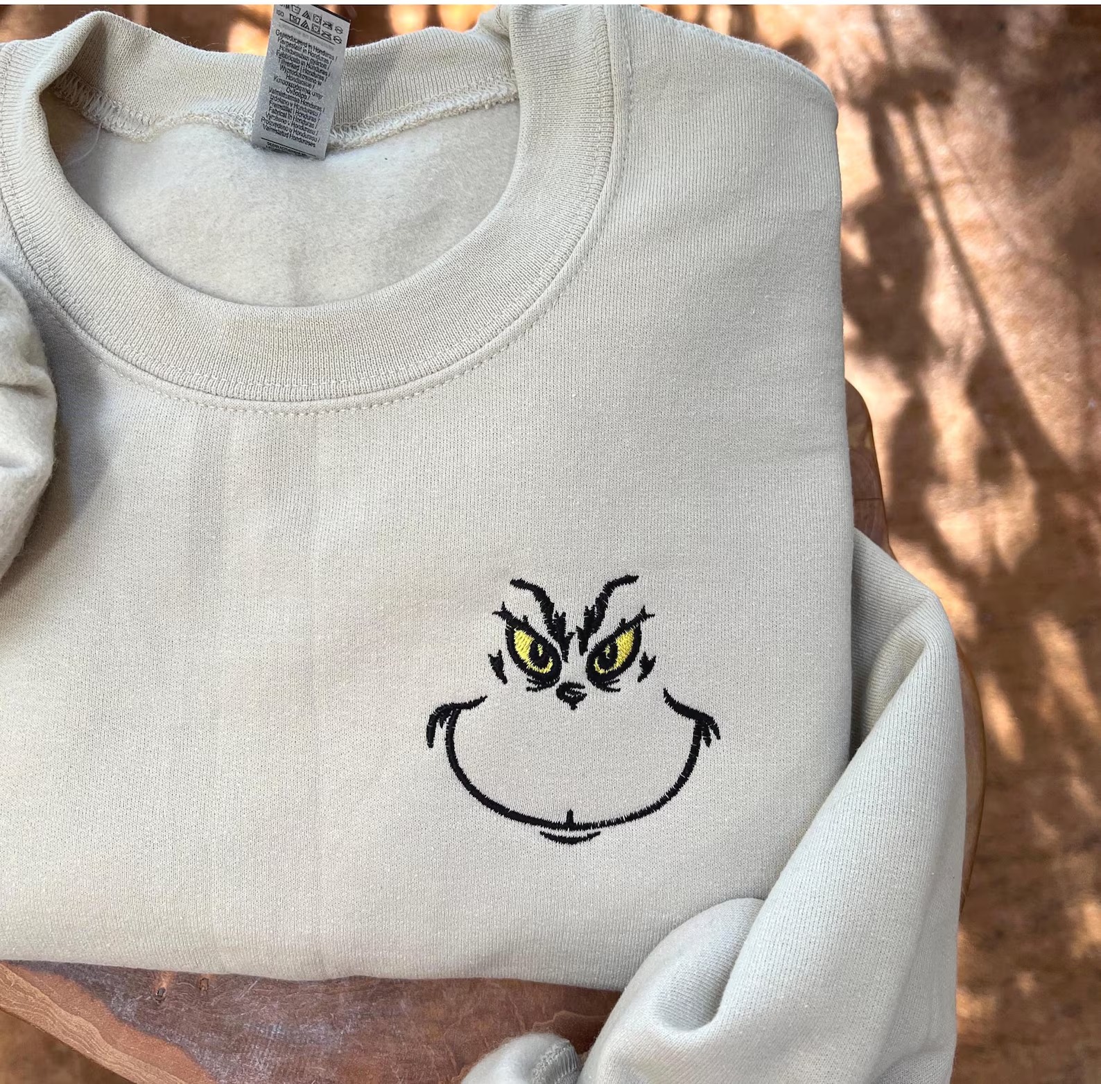 Embroidered Grinch Face Sweatshirt