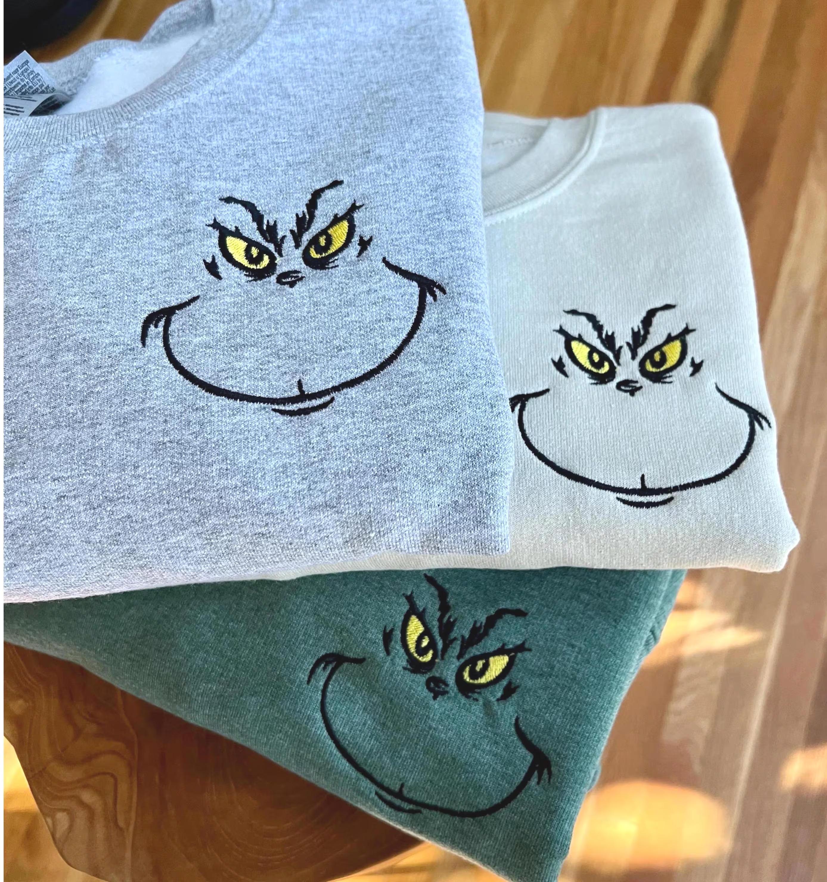 Embroidered Grinch Face Sweatshirt