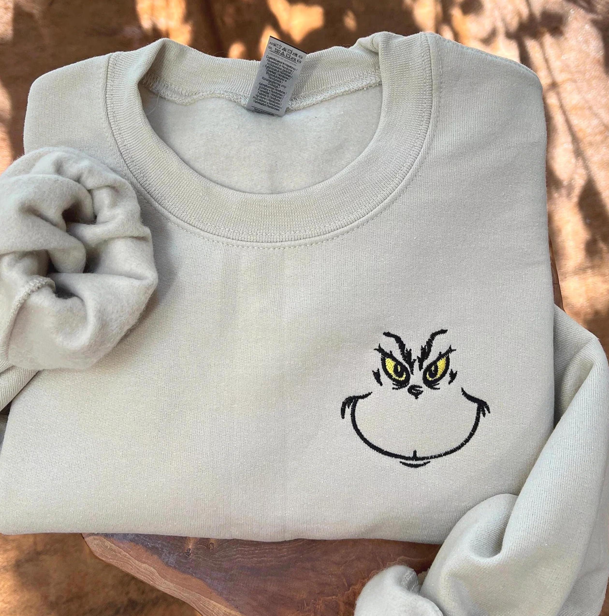 Embroidered Grinch Face Sweatshirt