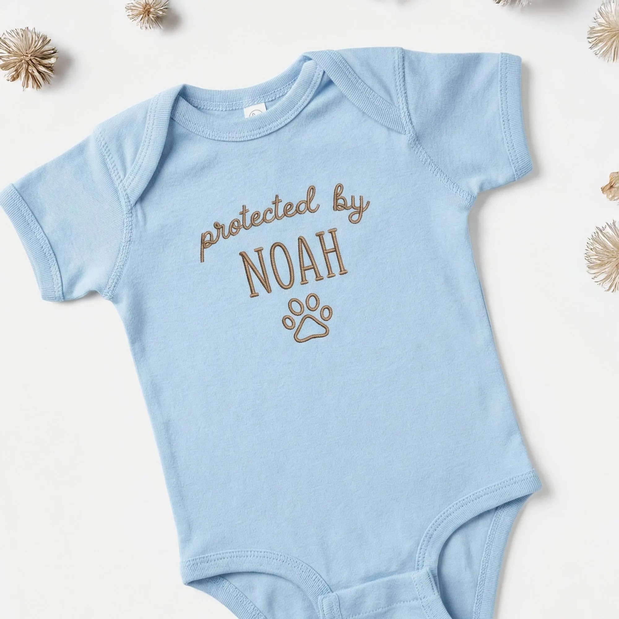 Protected by Baby Onesie - Custom Embroidered Pet Name Onesie
