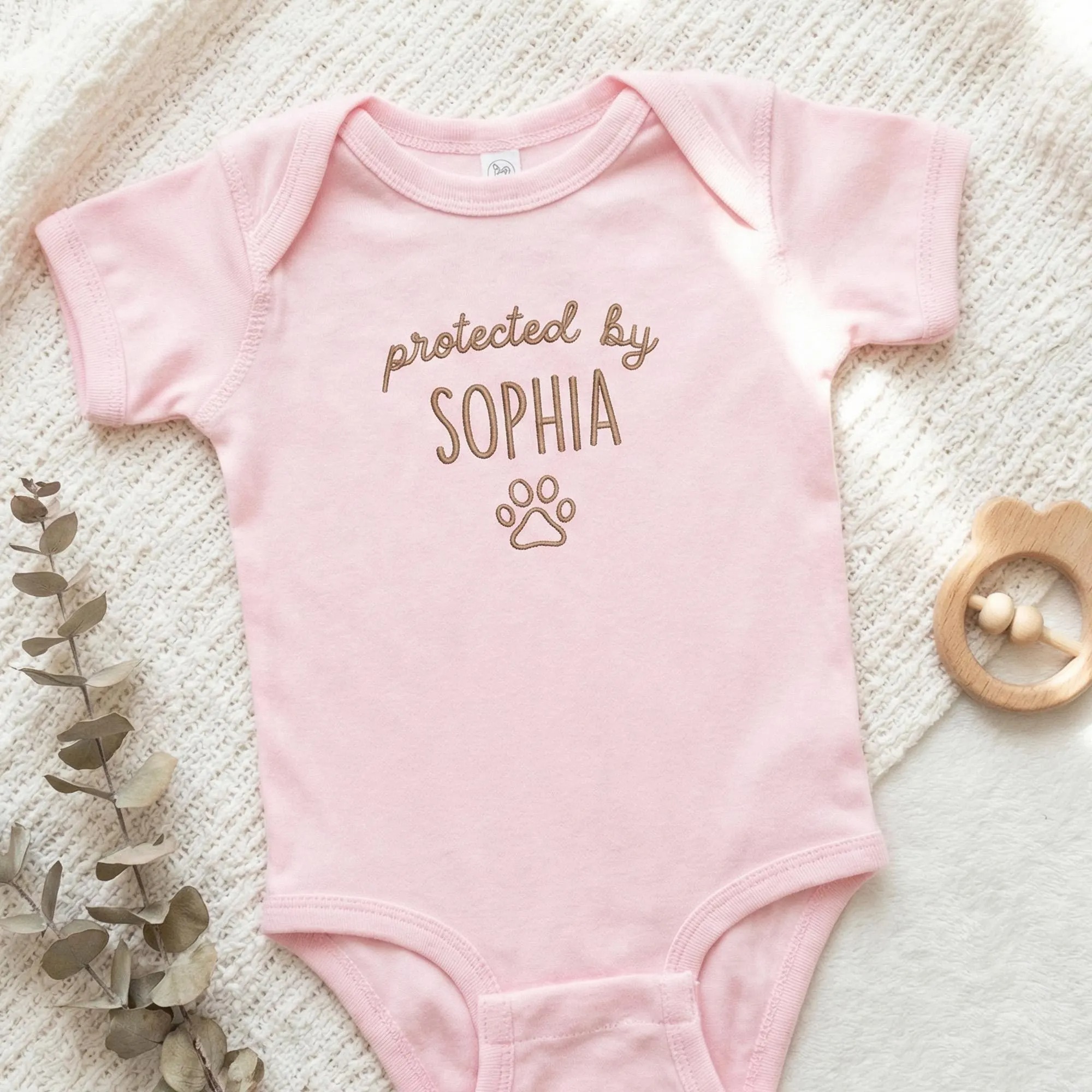 Protected by Baby Onesie - Custom Embroidered Pet Name Onesie