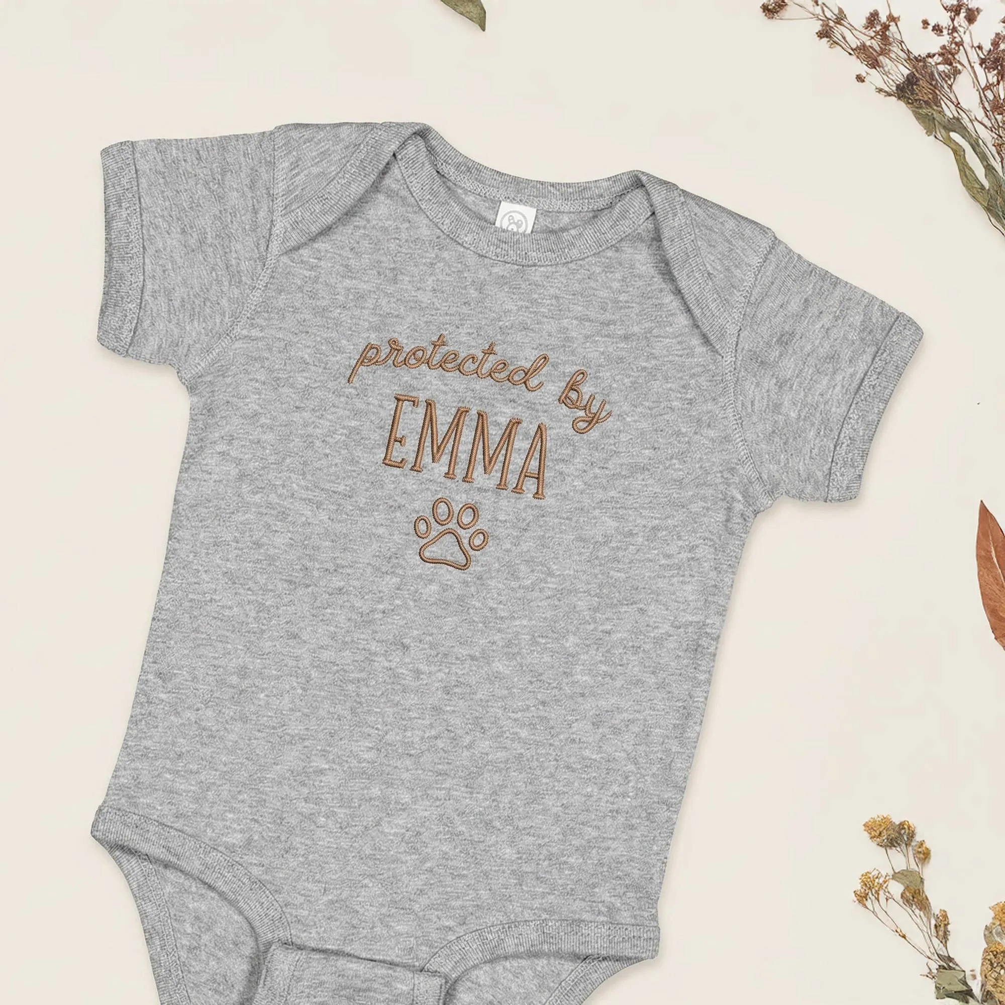 Protected by Baby Onesie - Custom Embroidered Pet Name Onesie