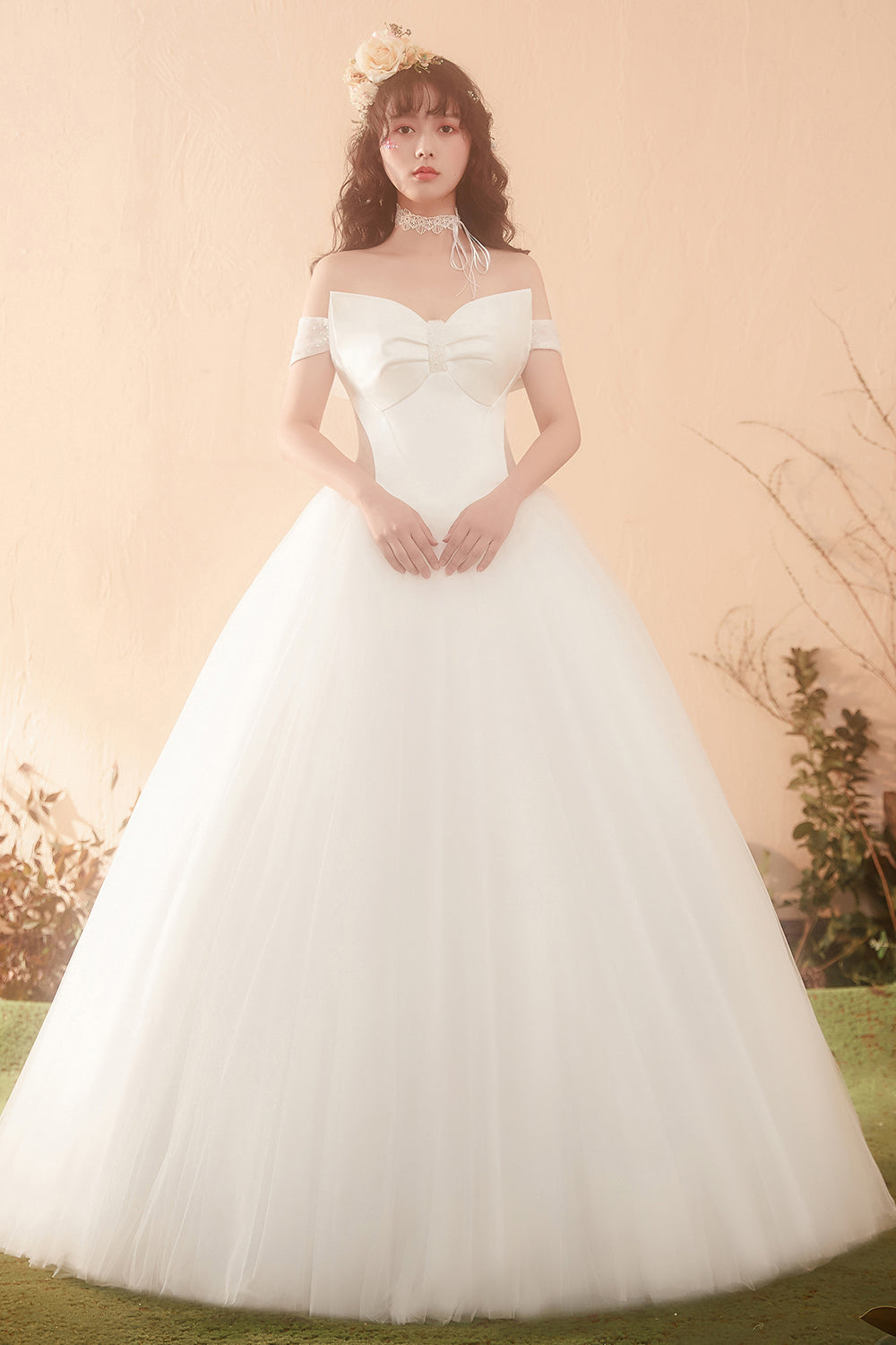 Elegant Off-Shoulder Ball Gown Wedding Dress with Statement Bow