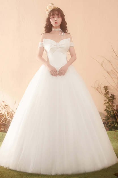 Elegant Off-Shoulder Ball Gown Wedding Dress with Statement Bow