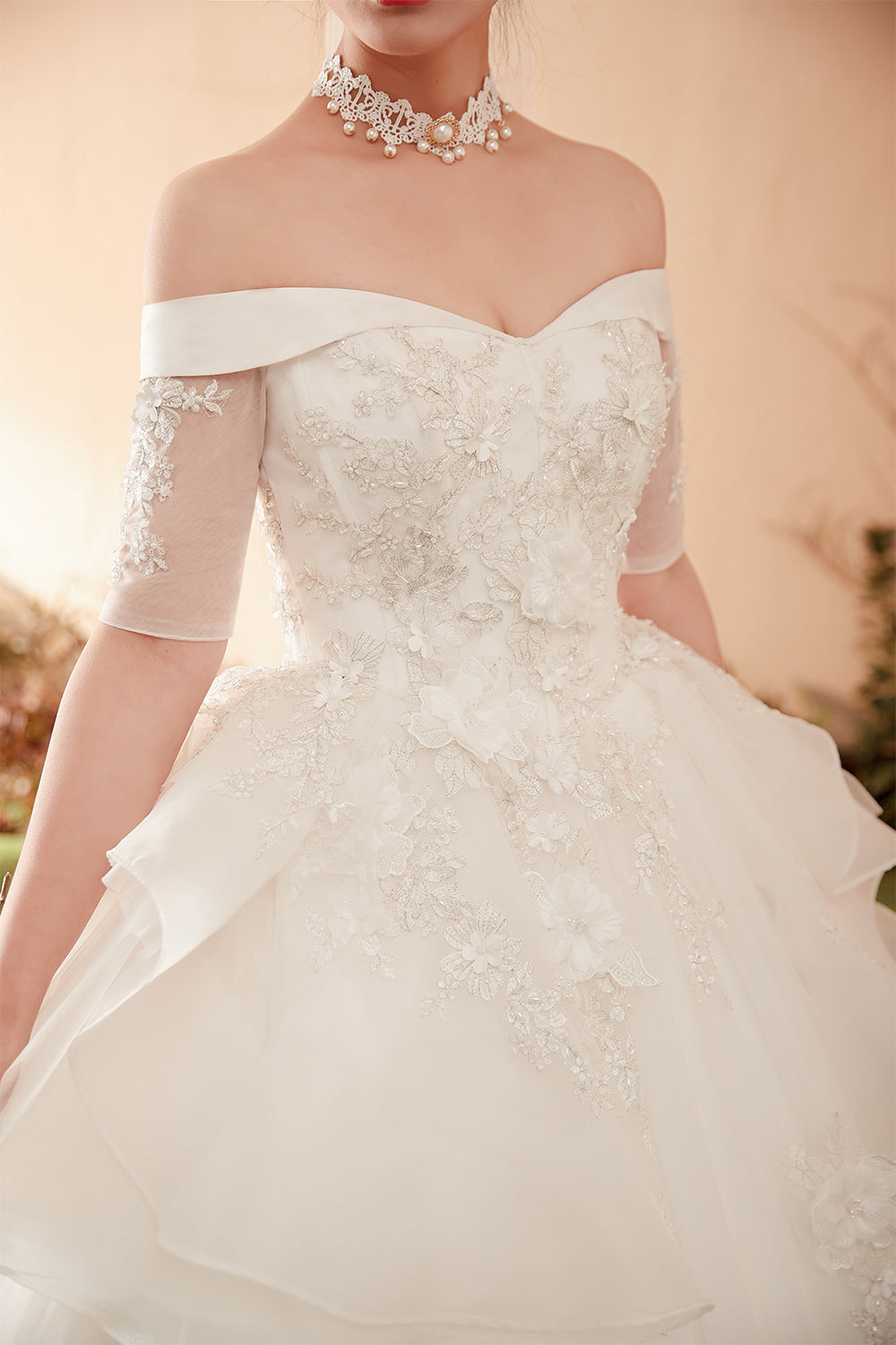 Exquisite Off-Shoulder Ball Gown Wedding Dress with Floral Lace Embellishments