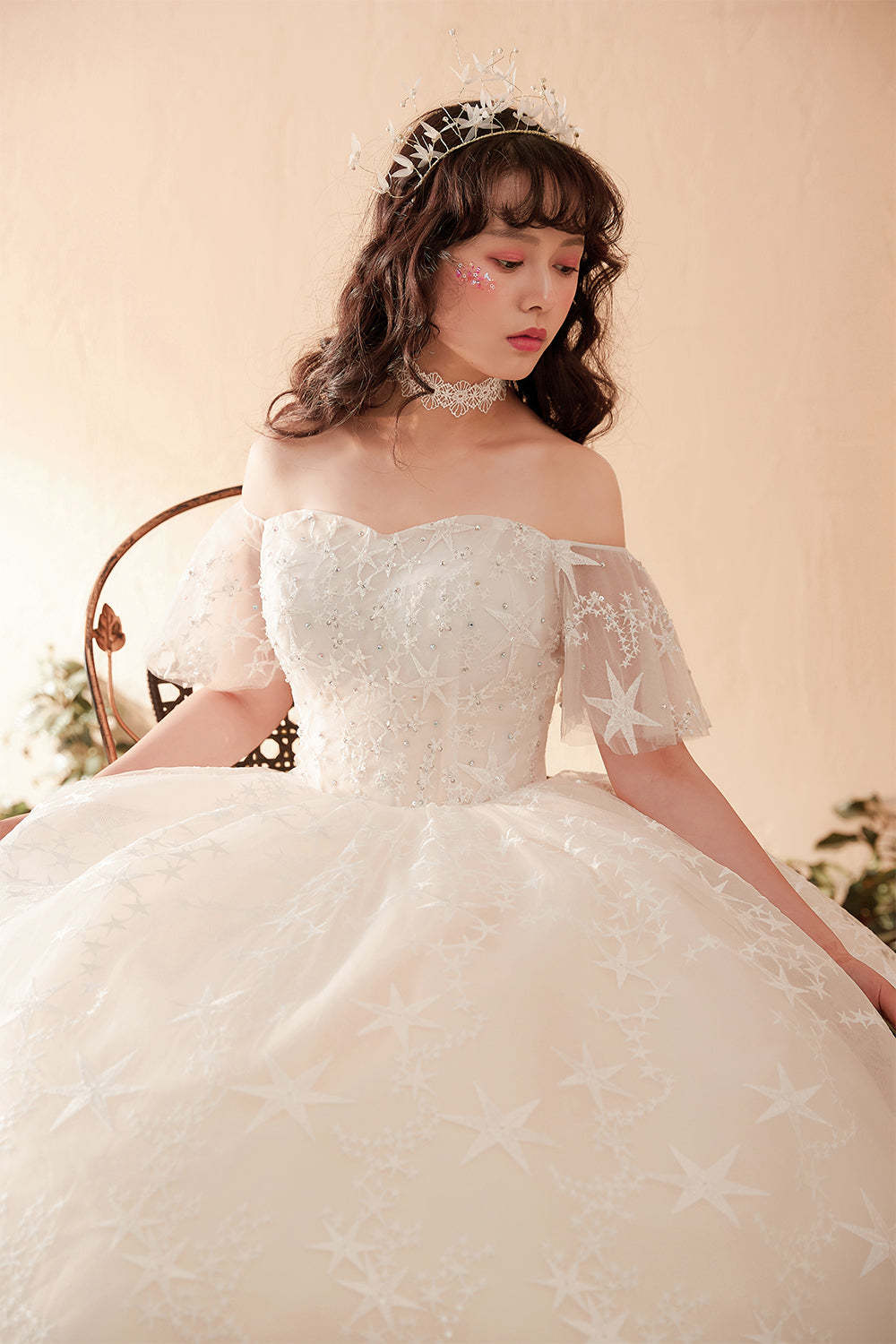 Ethereal Off-Shoulder Ball Gown Wedding Dress with Starry Embroidery