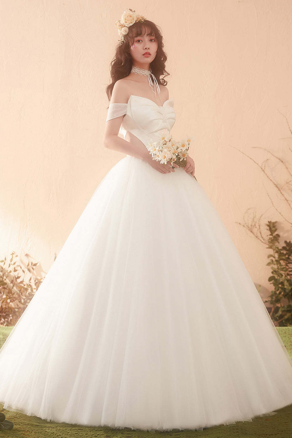 Elegant Off-Shoulder Ball Gown Wedding Dress with Statement Bow