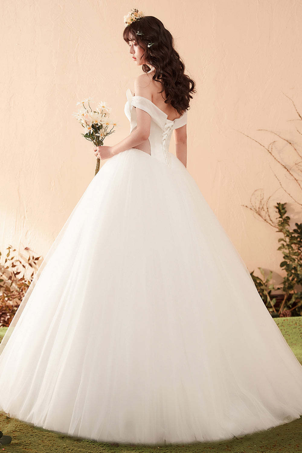 Elegant Off-Shoulder Ball Gown Wedding Dress with Statement Bow