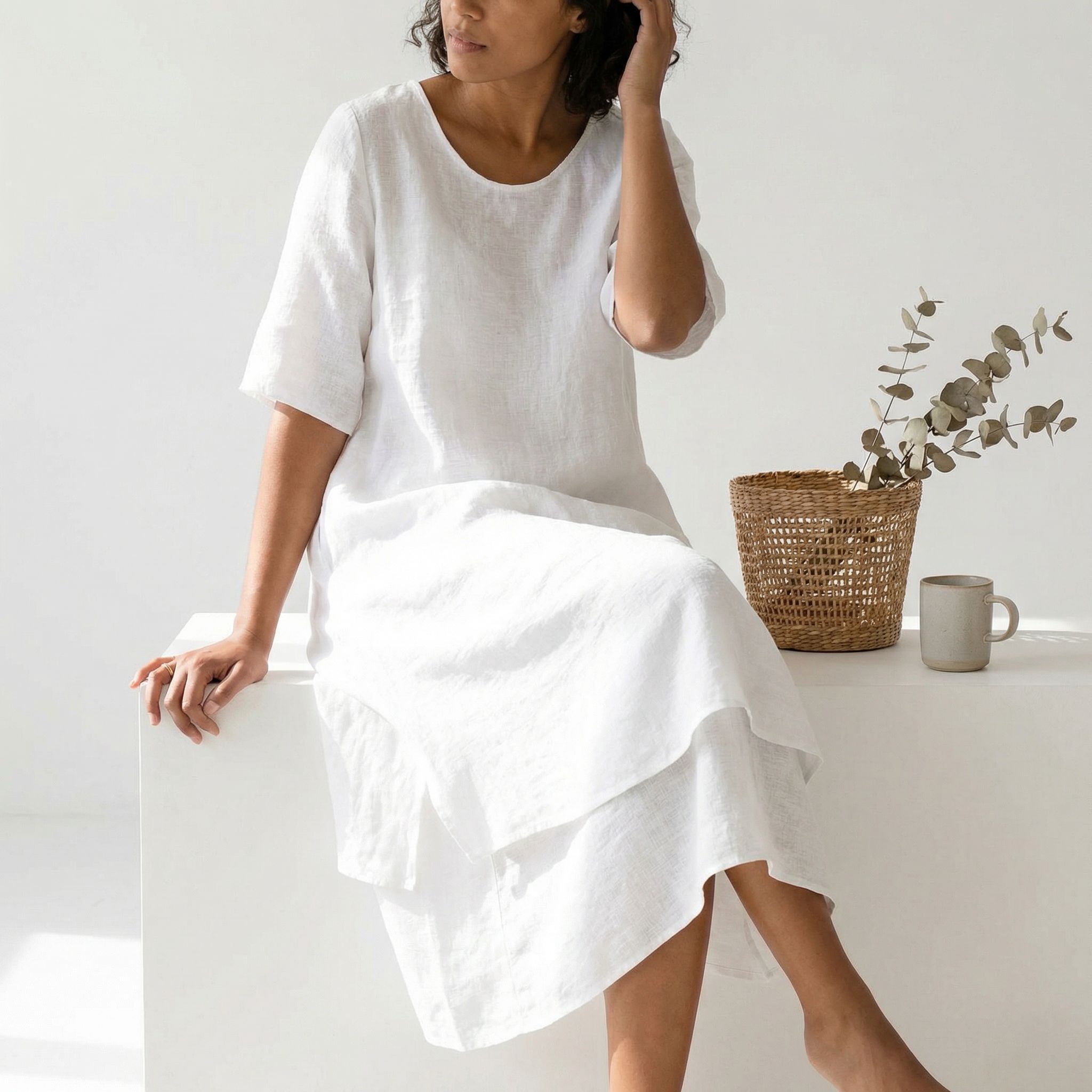 Model showcasing midi length dress