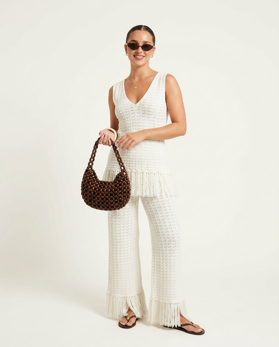 Ivory Bloom Resort Printed Romper Ivory Romper with Wide-Leg silhouette and Ribbed Knit texture, clean studio product view for Resort Wear, Coffee in Marais, Euro Chic Premium by Rieiss