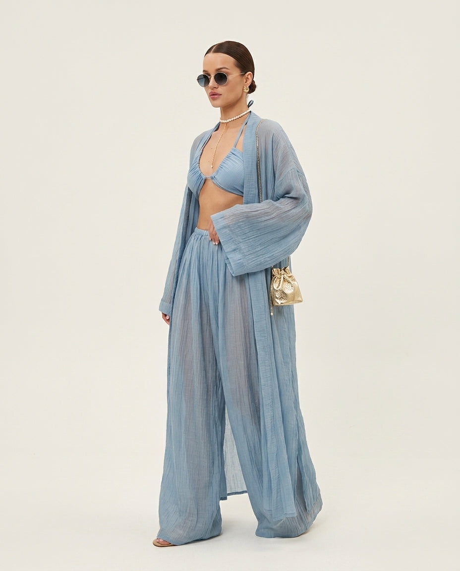 Light Blue Muse Resort Pleated Jacket Light Blue Jacket with Relaxed Fit silhouette and Textured texture, clean studio product view for Resort Wear, a private garden lunch, US East / Hamptons Elite by Rieiss