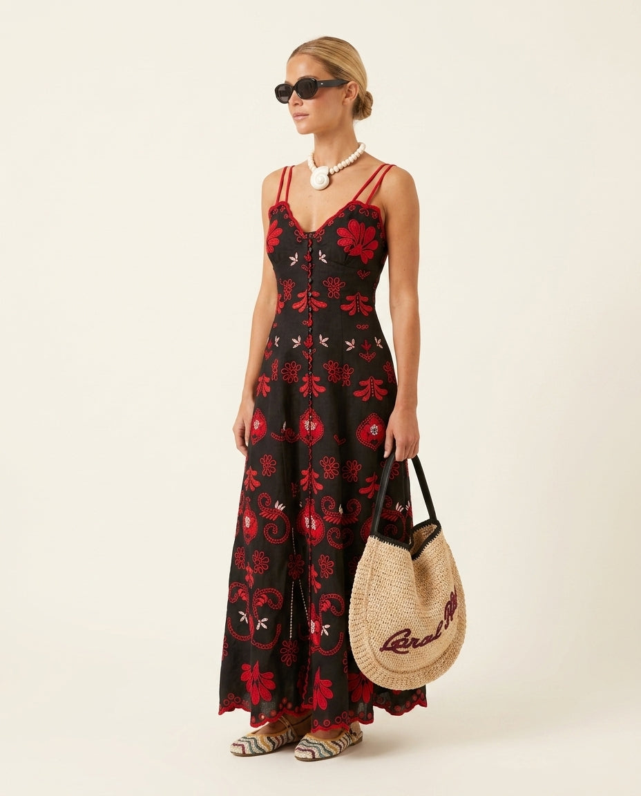 Black Allure Resort Embroidered Maxi Dress Black Maxi Dress with Relaxed Fit silhouette and Textured texture, clean studio product view for Resort Wear, a gallery opening in Paris, Euro Chic Premium by -
