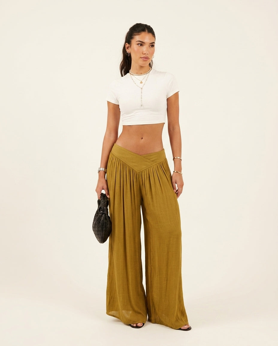 Olive Green Muse Resort Textured Romper Olive Green Romper with Wide-Leg silhouette and Textured texture, clean studio product view for Resort Wear, a rooftop dinner in LA, US Coastal Glam