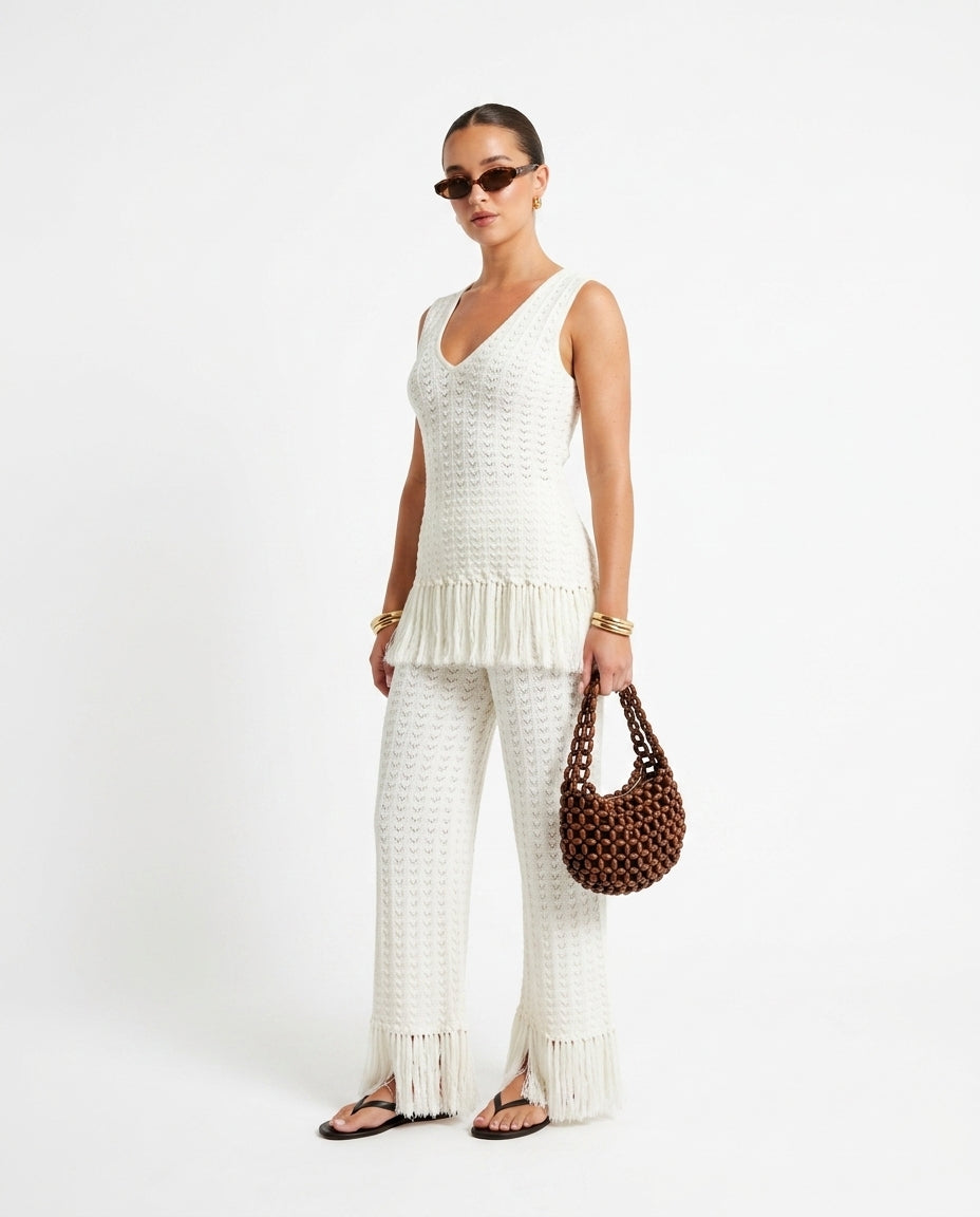 Ivory Bloom Resort Printed Romper Ivory Romper with Wide-Leg silhouette and Ribbed Knit texture, side or back garment view for Resort Wear, Coffee in Marais, Euro Chic Premium by Rieiss