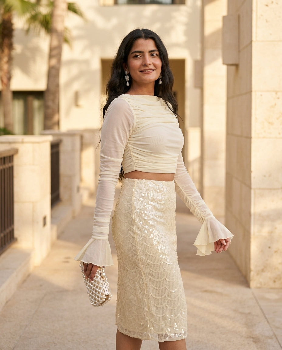 Ivory Lustre Evening Ruched Two-Piece Set Ivory Two-Piece Set with Asymmetric silhouette and Textured texture, lifestyle scene image for Date Night, a rooftop dinner in LA, US Coastal Glam