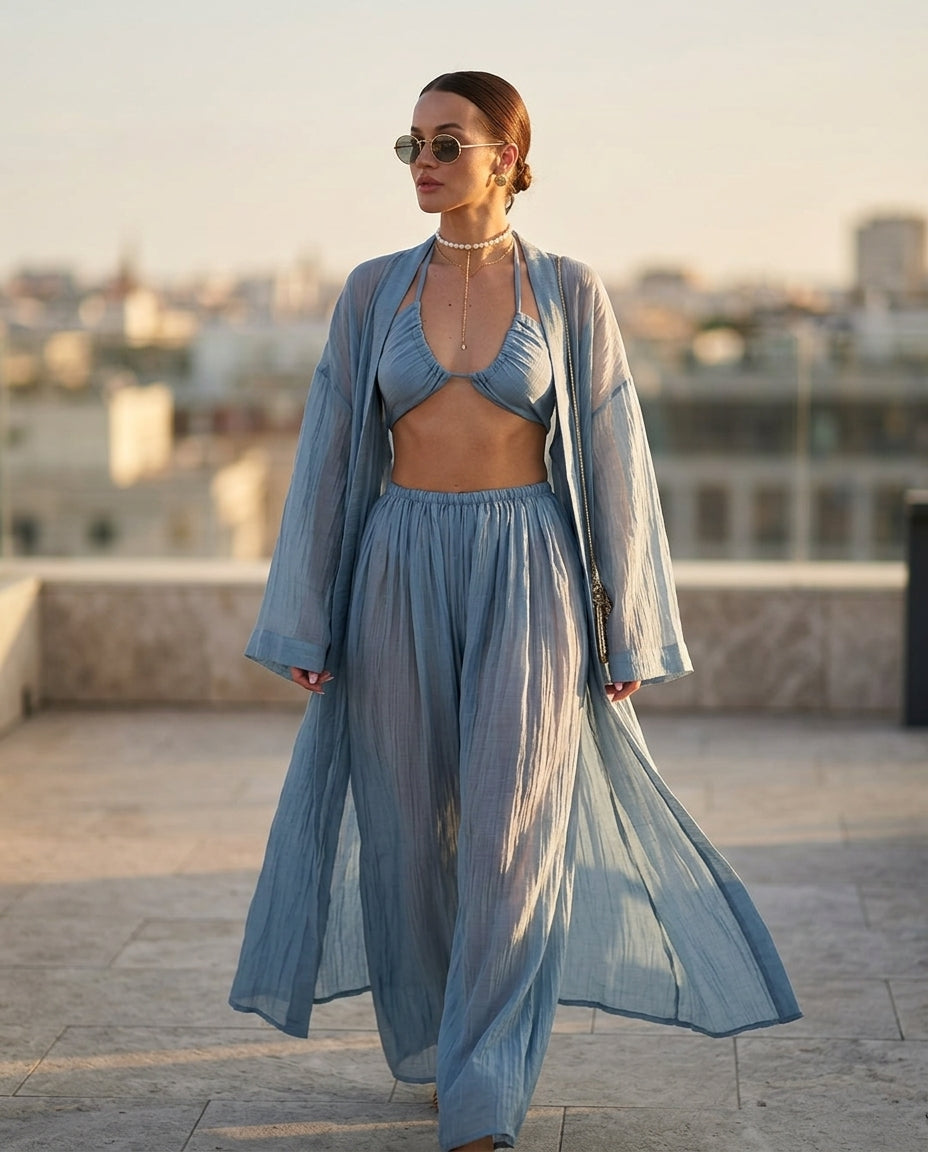 Light Blue Muse Resort Pleated Jacket Light Blue Jacket with Relaxed Fit silhouette and Textured texture, outdoor styling image for Resort Wear, a private garden lunch, US East / Hamptons Elite by Rieiss