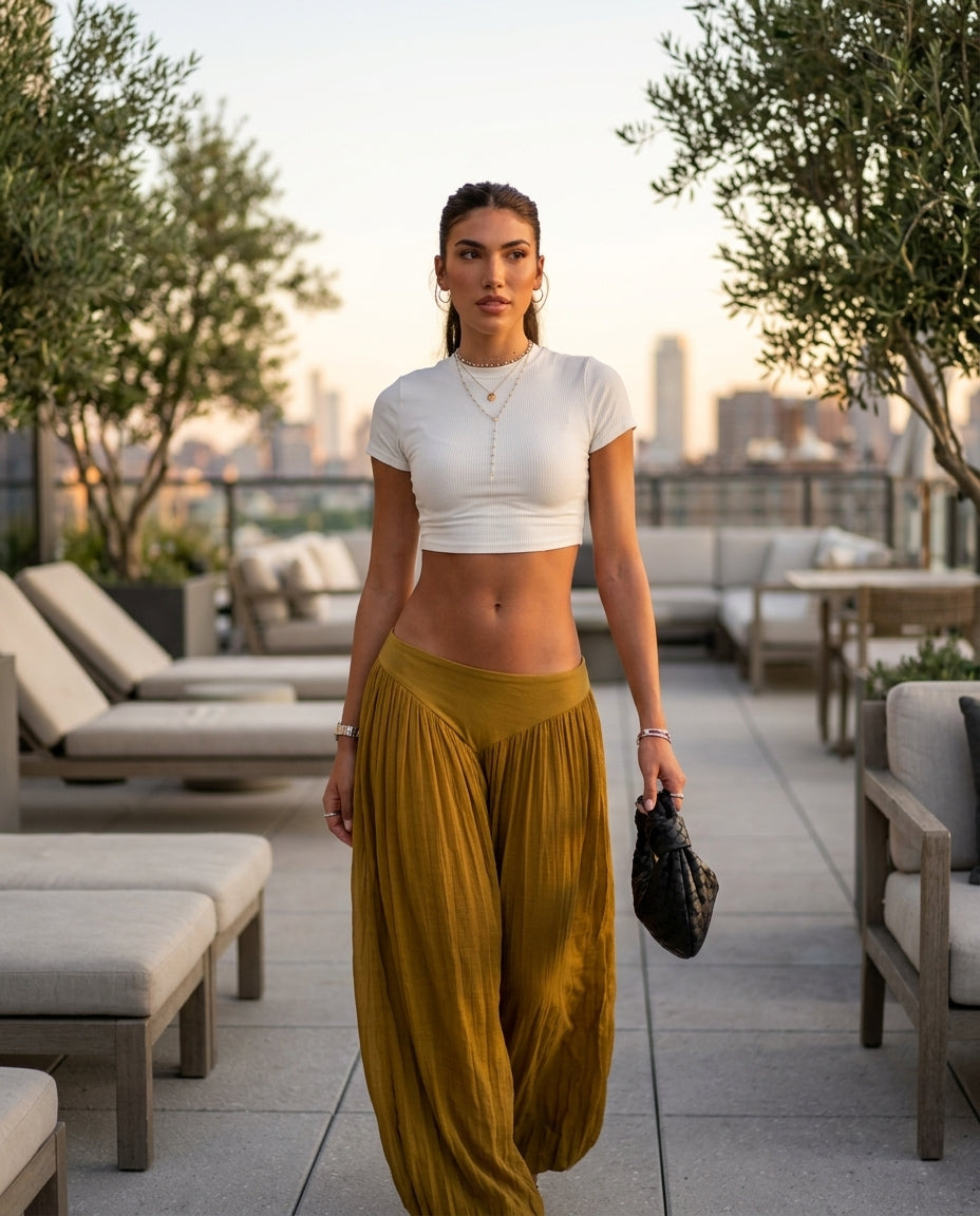 Olive Green Muse Resort Textured Romper Olive Green Romper with Wide-Leg silhouette and Textured texture, outdoor styling image for Resort Wear, a rooftop dinner in LA, US Coastal Glam