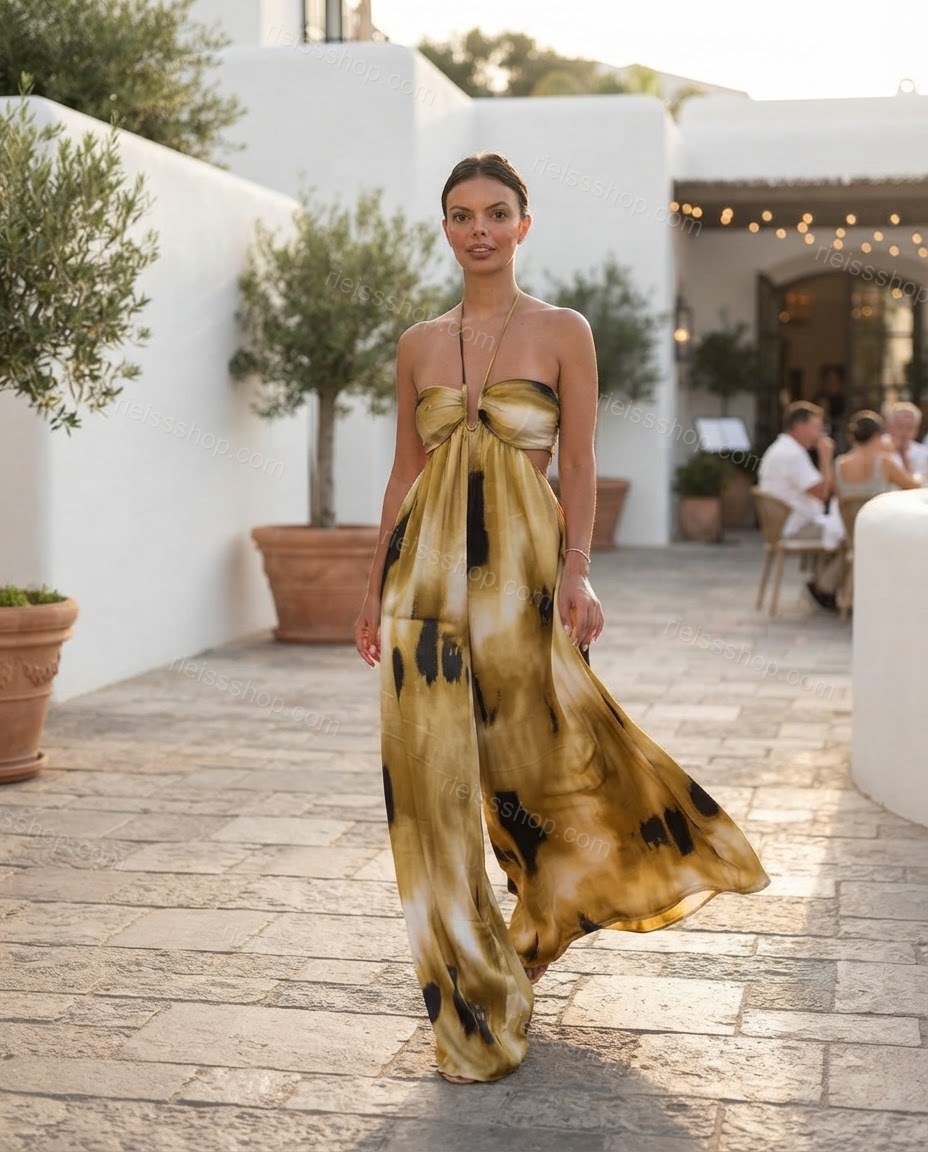 Mustard Muse City Layer Abstract Print Jumpsuit Mustard Jumpsuit with Wide-Leg silhouette and Satin texture, outdoor styling image for Pre-Fall, an office-to-dinner transition, Fall current summer selling first with a light late-summer/pre-fall accent: ma by rieissshop