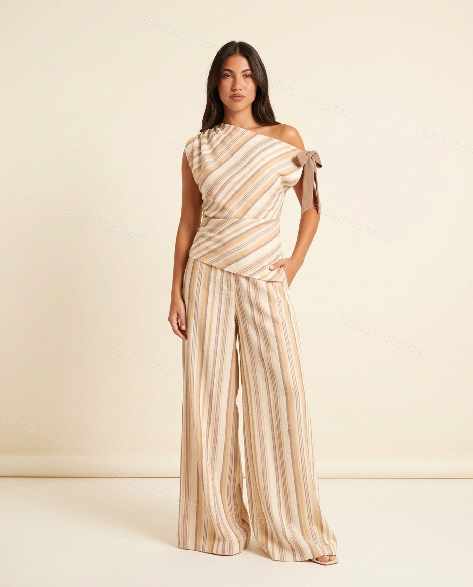 Ivory Glow Office Edit Striped Jumpsuit Ivory Jumpsuit with Asymmetric silhouette and Textured texture, clean studio product view for Pre-Fall, a gallery evening, Fall current summer selling first with a light late-summer/pre-fall accent: make it wearable by rieissshop