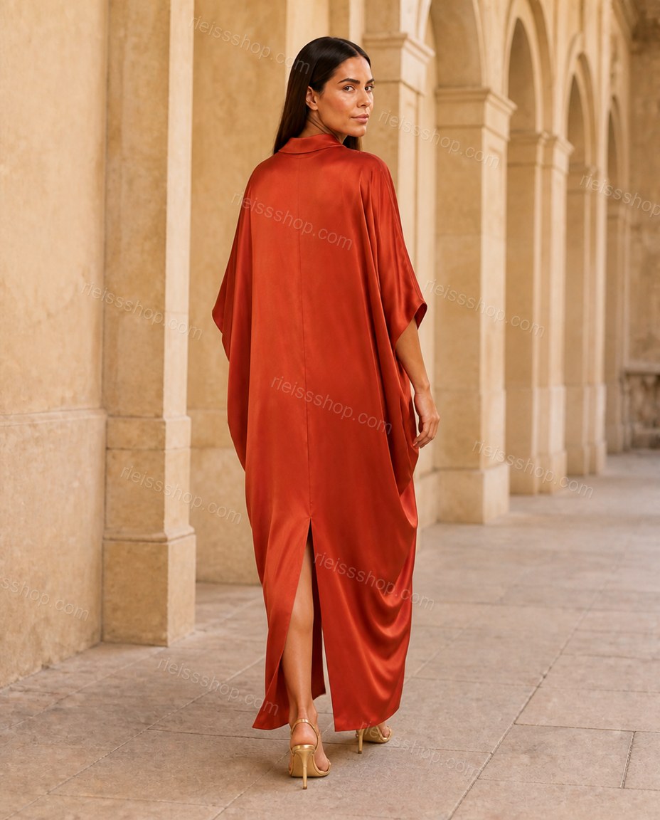 Orange Sleek Satin V-Neck Jumpsuit Orange Jumpsuit with Relaxed Fit silhouette and Satin texture, editorial ecommerce scene for Day-to-Night, a dinner reservation, Fall late-summer city plans and early-fall occasions, Euro Chic Premium by RIEISSSHOP