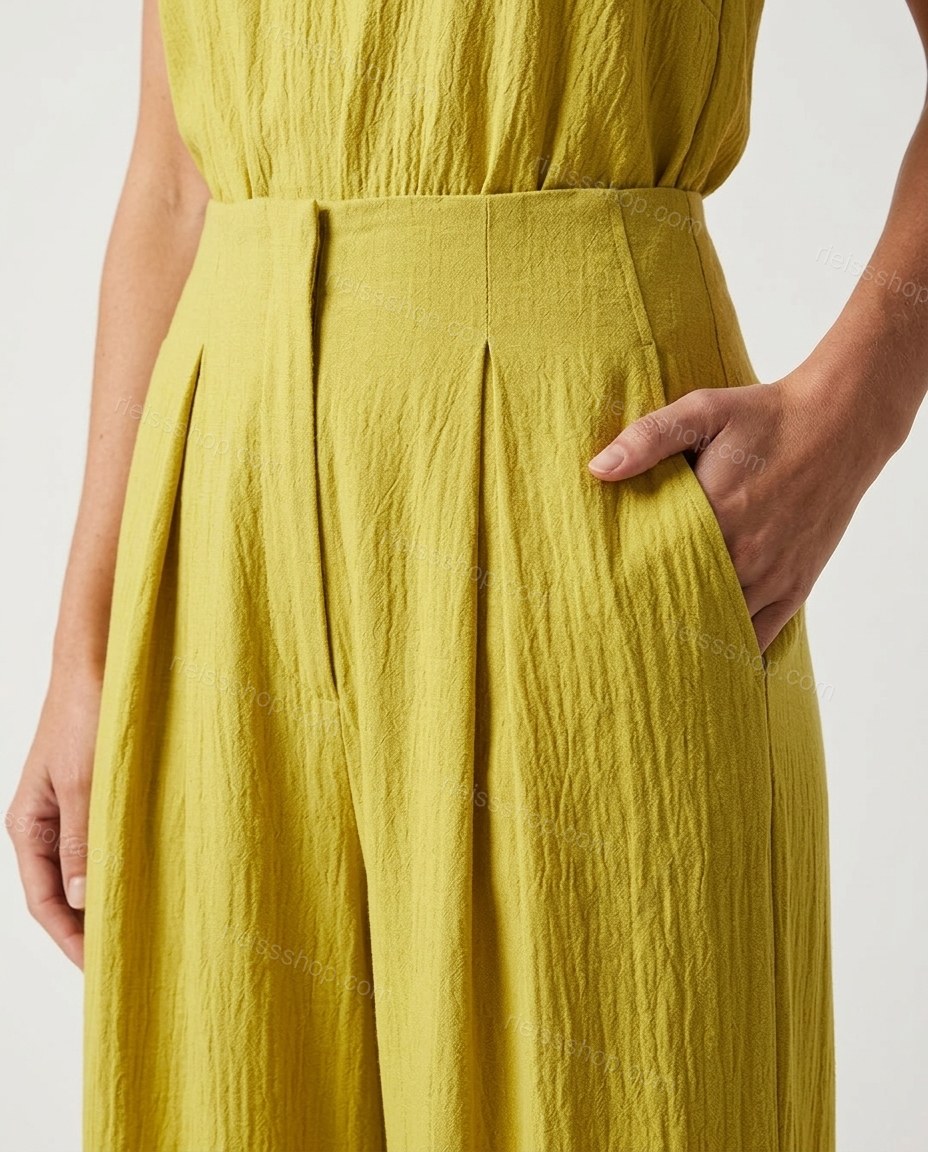Yellow-green Halter Pleated Jumpsuit, close-up of side pockets, front pleats and elasticated waist, by Rieissshop