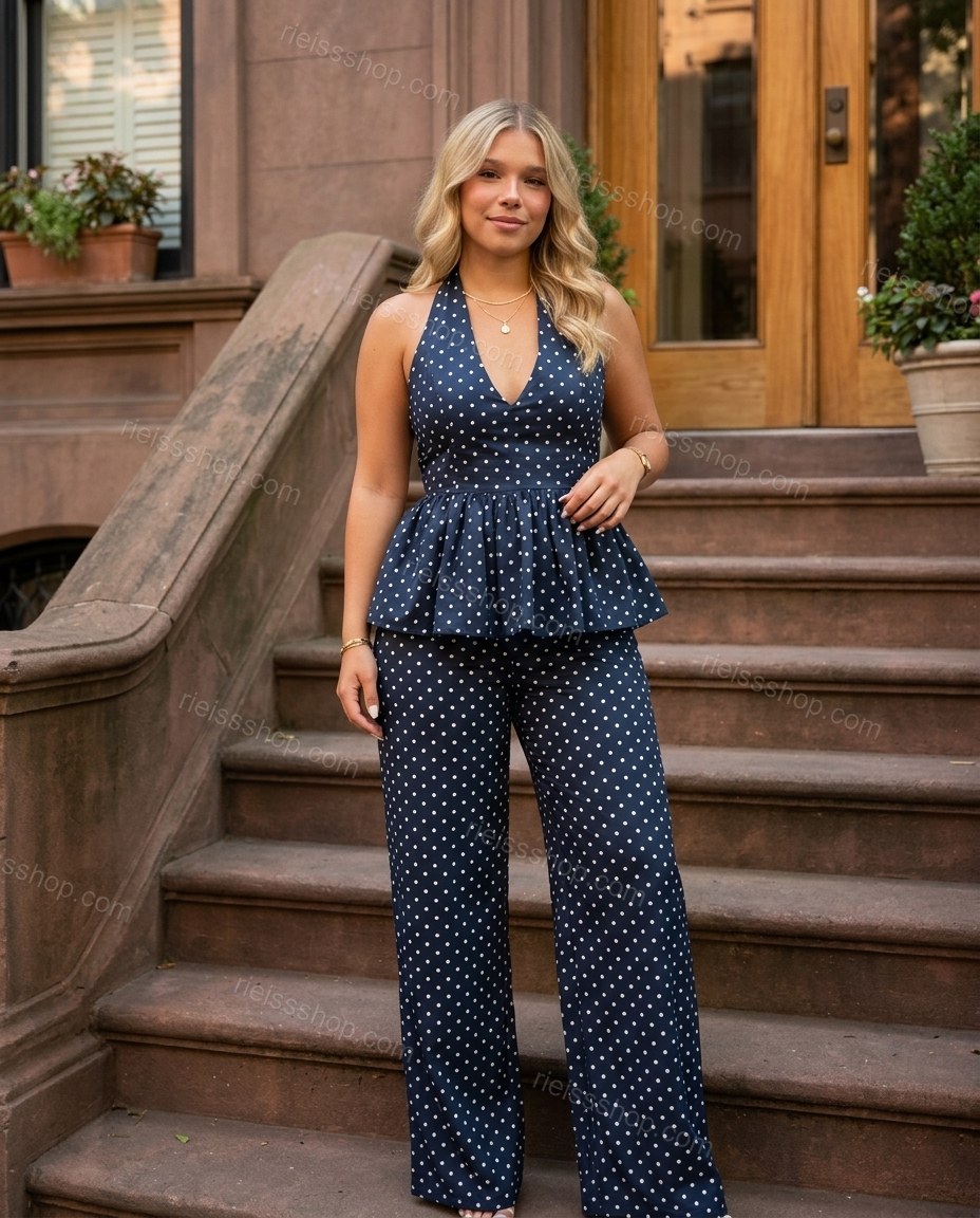 Navy Polka Dot Halter Peplum Jumpsuit, three-quarter brand lifestyle view, by Rieissshop
