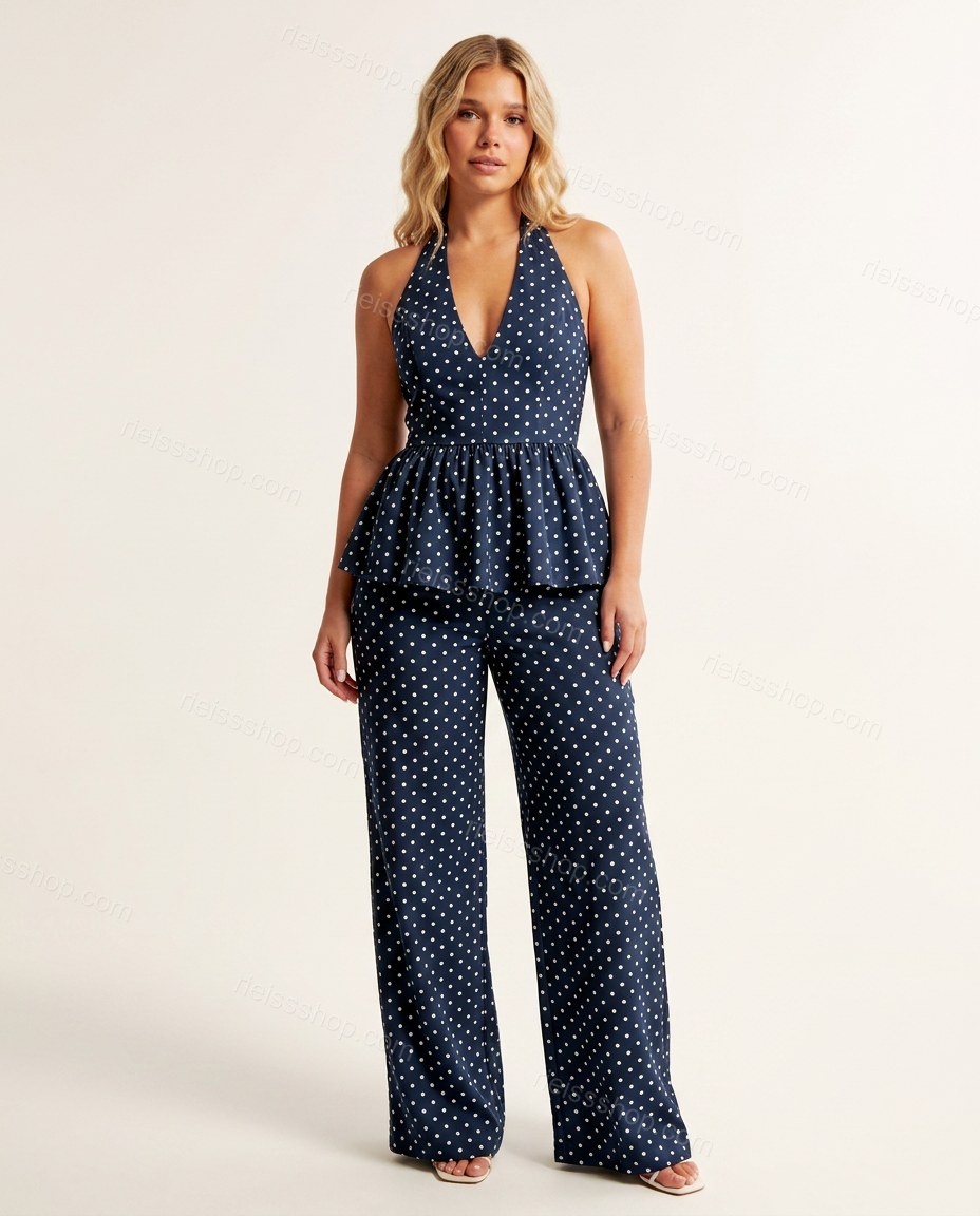 Navy Polka Dot Halter Peplum Jumpsuit, front studio view, by Rieissshop