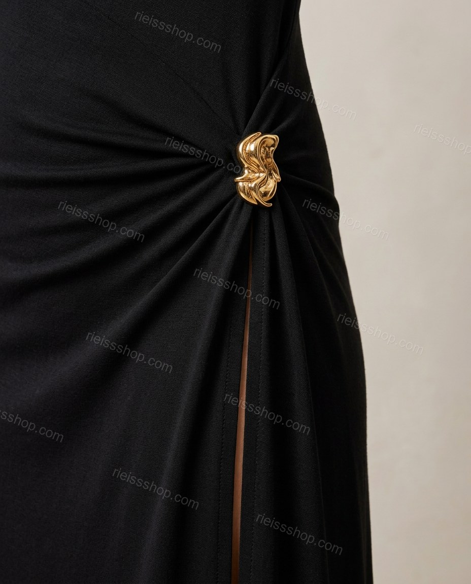 Black Maxi Knit Dress, close-up of high slit, button detail and gold-tone hip embellishment, by Rieissshop
