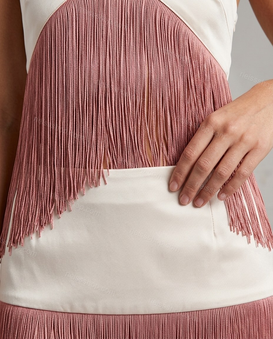 Off-white Mini Halter Ruffled Top & Skirt Set, close-up of dusty rose accents, fringe overlay and halter neck, by Rieissshop