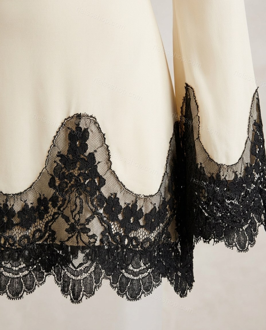 Black Mini Open-Back Lace Dress, close-up of lace trim, open back and tie closure, by Rieissshop