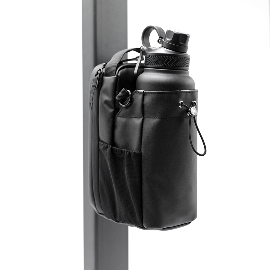 Magnetic water bottle pouch - can conceal firearms