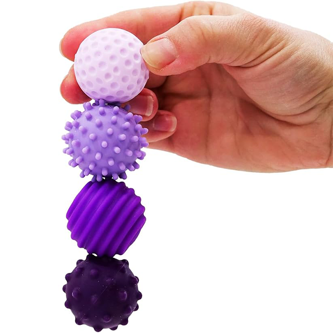Silicone magnetic balls with textured, wavy surfaces