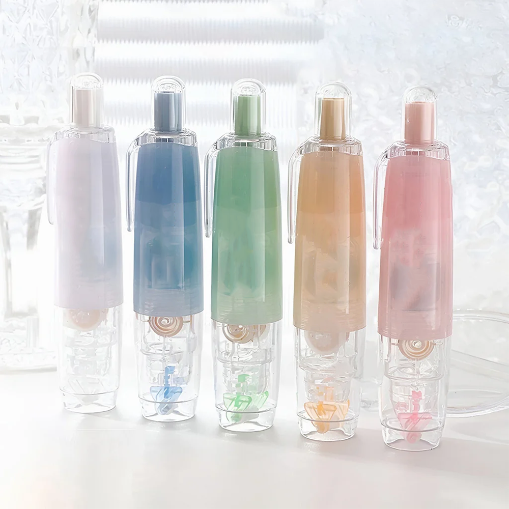 Push-to-use adhesive dots, retractable tape pen