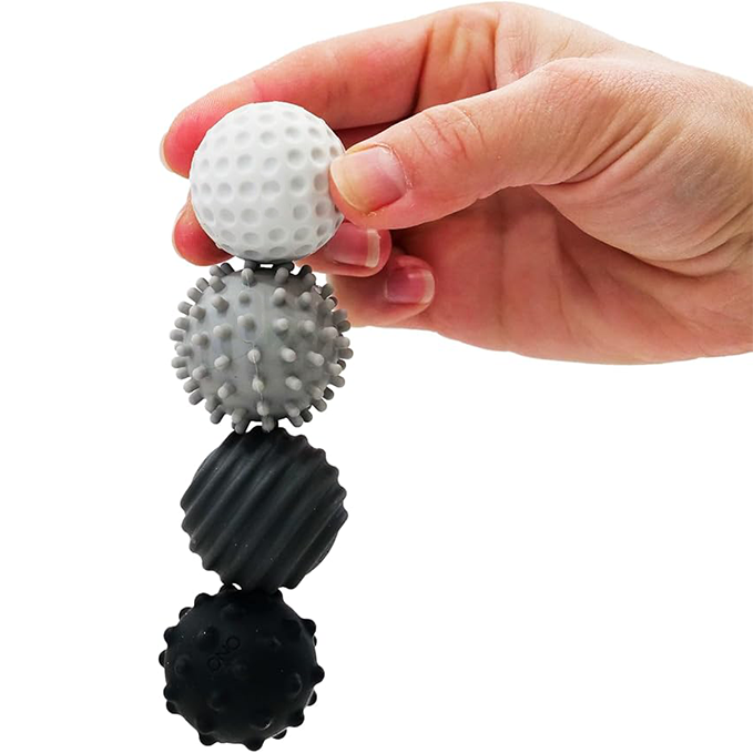 Silicone magnetic balls with textured, wavy surfaces