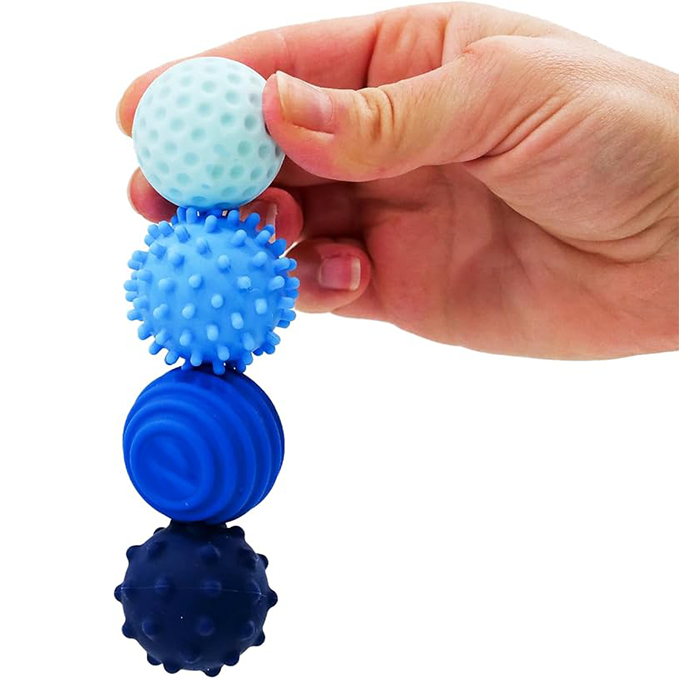 Silicone magnetic balls with textured, wavy surfaces
