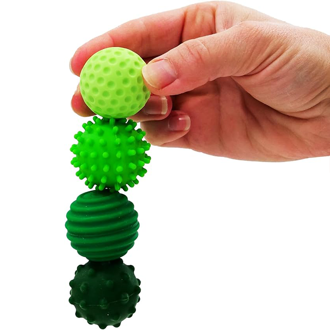Silicone magnetic balls with textured, wavy surfaces
