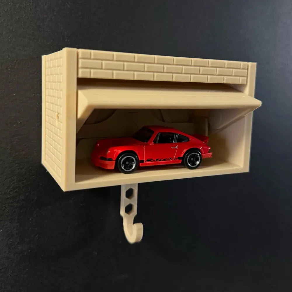 Garage-shaped keychain - can hold a small car