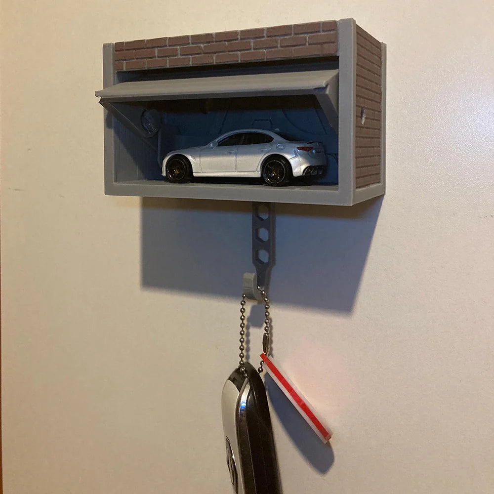 Garage-shaped keychain - can hold a small car