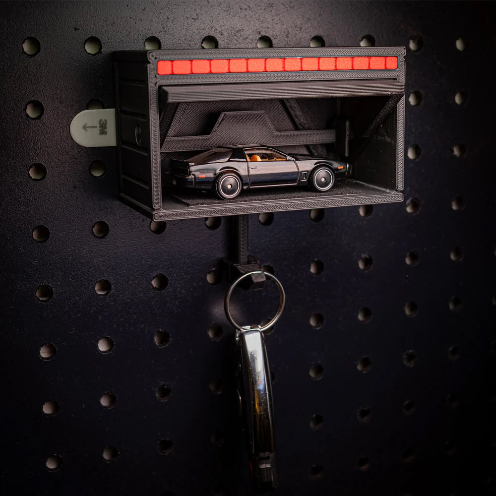 Garage-shaped keychain - can hold a small car