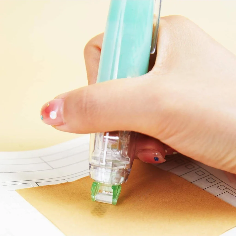 Push-to-use adhesive dots, retractable tape pen