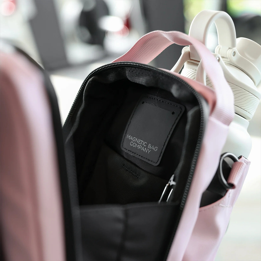 Magnetic water bottle pouch - can conceal firearms